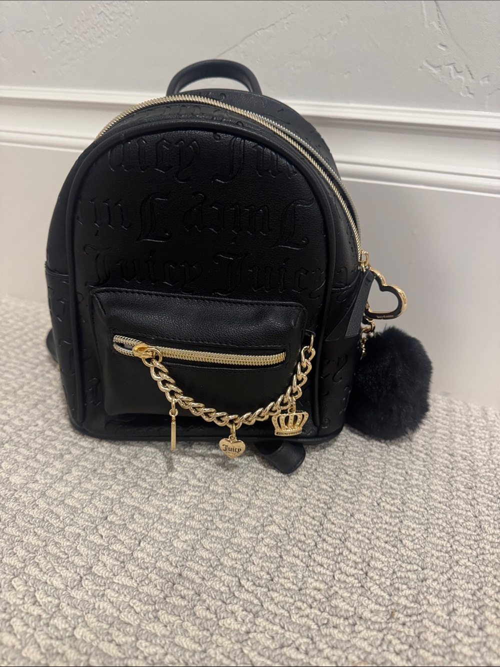 Juicy Couture Black Mini Backpack with Gold Charm Chain and Pom